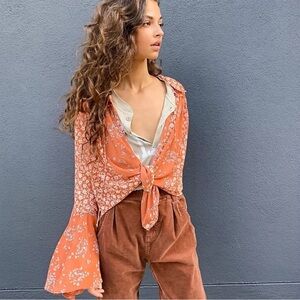 NWOT Free People Serena Bell sleeves blouse.